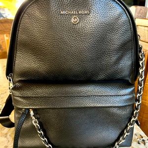 SOLD. …Michael Kors Purse Backpack.  Black Leather Excellent Used Condition.